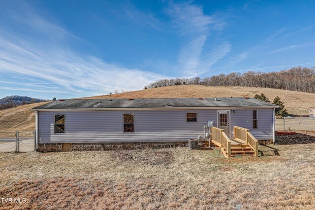 252 Scott Ln, Blountville, TN 37617 - rear view of house featuring central air condition unit and fence