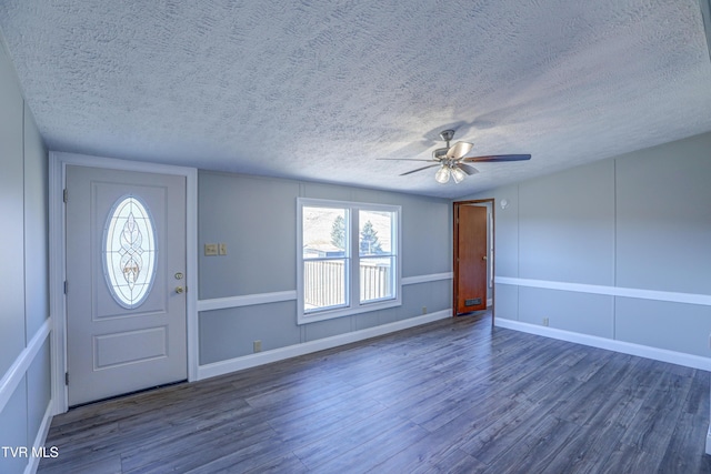 252 Scott Ln, Blountville, TN 37617 - foyer with a textured ceiling, baseboards, ceiling fan, and wood finished floors