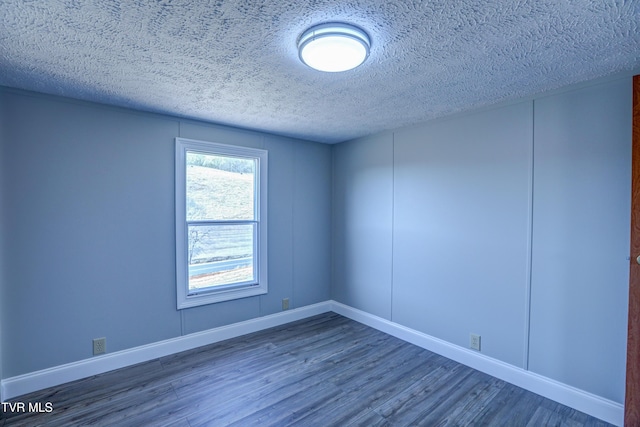 252 Scott Ln, Blountville, TN 37617 - spare room featuring a textured ceiling, baseboards, and wood finished floors