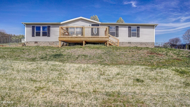 252 Scott Ln, Blountville, TN 37617 - view of front facade featuring fence, a wooden deck, crawl space, and a front yard