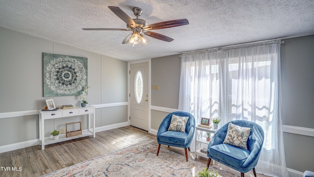 252 Scott Ln, Blountville, TN 37617 - sitting room featuring baseboards, a textured ceiling, wood finished floors, and a ceiling fan