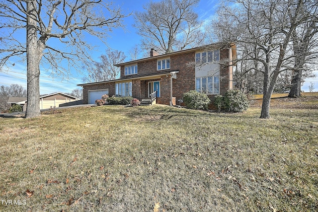 front facade with a garage and a front lawn