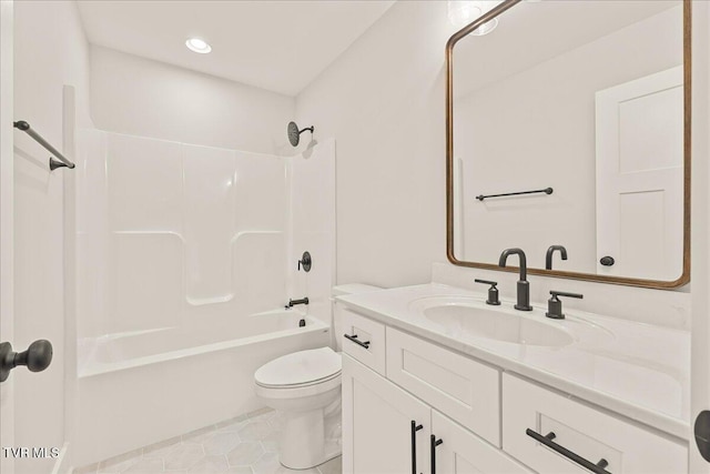 full bathroom with washtub / shower combination, vanity, toilet, and tile patterned floors