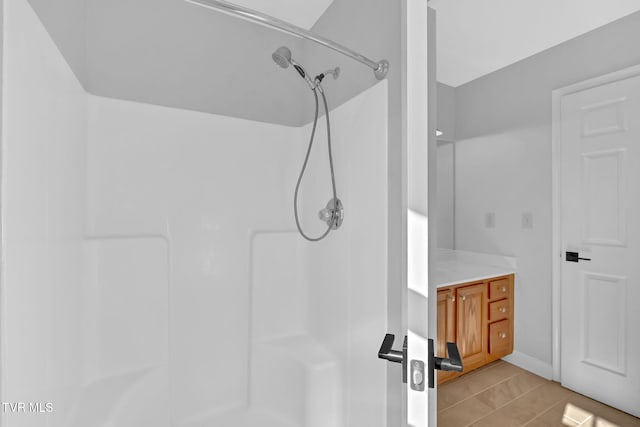 bathroom featuring vanity and walk in shower