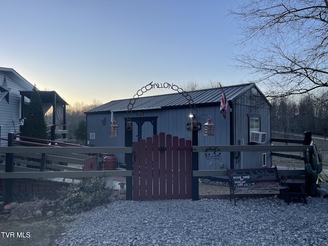 view of front of house with cooling unit