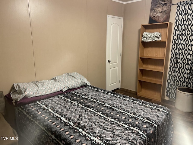 bedroom featuring hardwood / wood-style floors