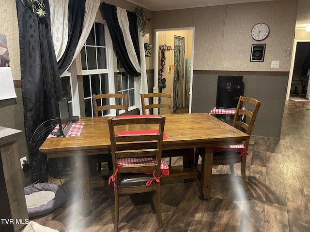 dining space featuring dark hardwood / wood-style flooring