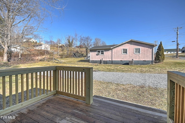 deck featuring a lawn