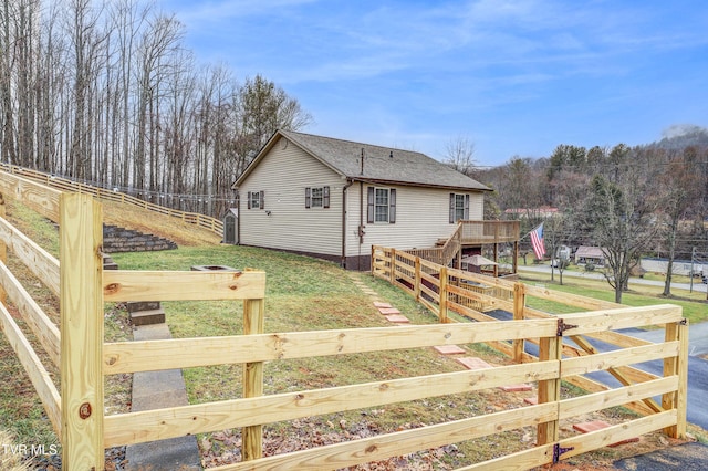 exterior space featuring a front lawn