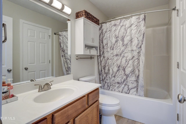 full bathroom featuring vanity, shower / bath combination with curtain, and toilet