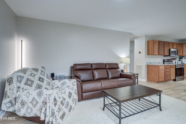 living room featuring light hardwood / wood-style floors