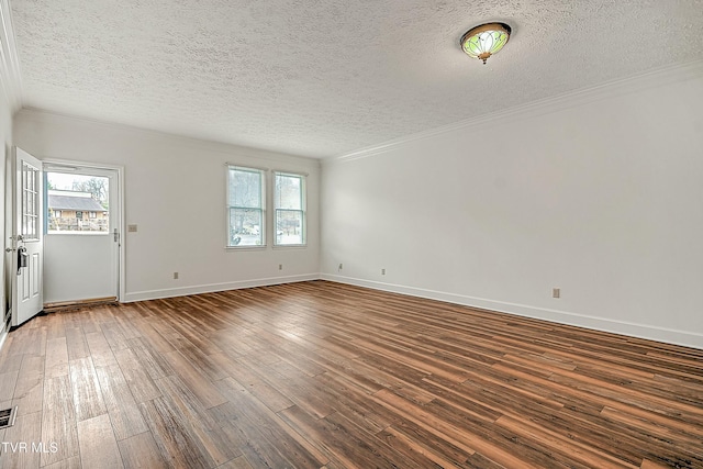 unfurnished room featuring wood-type flooring, a textured ceiling, and plenty of natural light