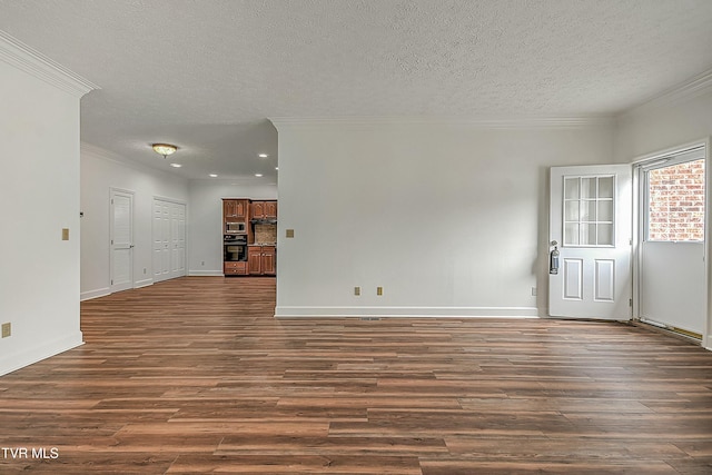 unfurnished living room featuring crown molding, dark hardwood / wood-style flooring, and a textured ceiling