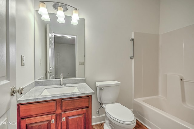 full bathroom featuring vanity, shower / bathtub combination, and toilet