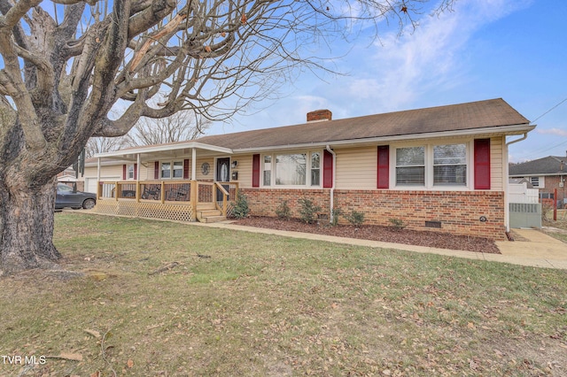 ranch-style house featuring a porch and a front yard