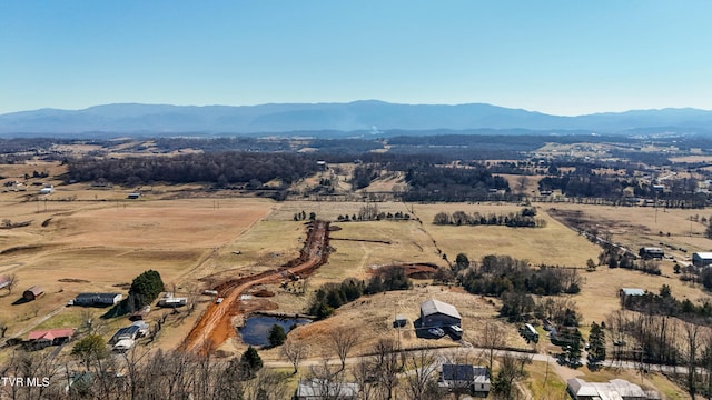 aerial view with a rural view and a mountain view