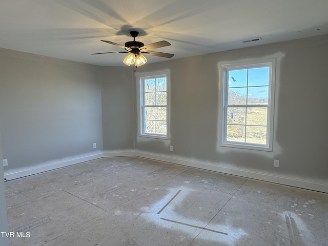 unfurnished room with ceiling fan