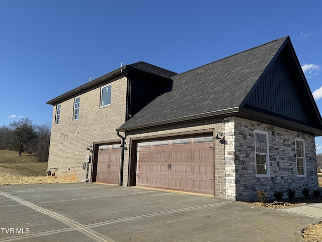 view of property exterior with a garage