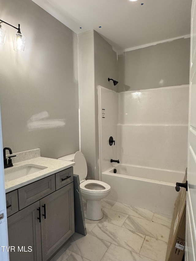 full bathroom with toilet, vanity, and shower / bathing tub combination