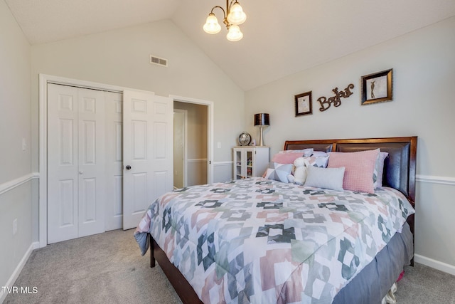 carpeted bedroom with a notable chandelier, high vaulted ceiling, and a closet