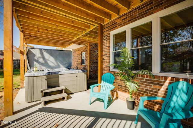 view of patio featuring a hot tub