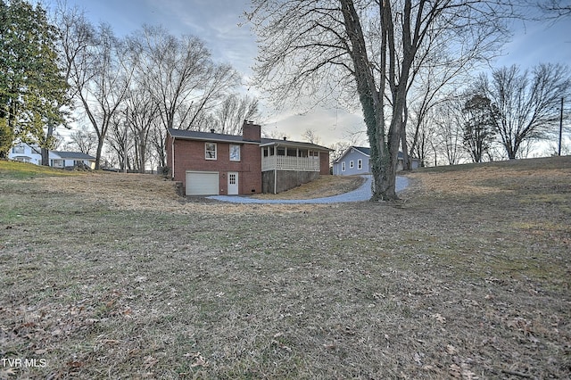 view of yard with a garage