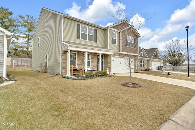 view of front of property with a garage, a front yard, and a porch