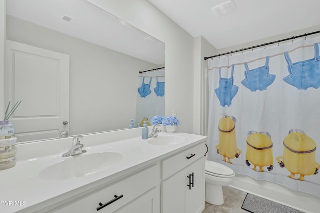 full bathroom with vanity, shower / bath combination with curtain, and toilet