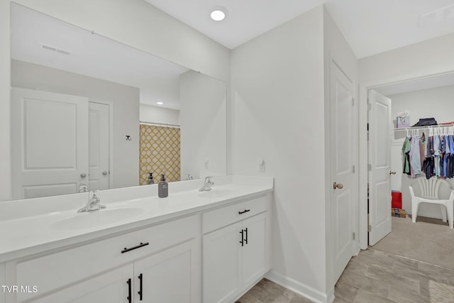 bathroom with vanity and a shower with shower curtain