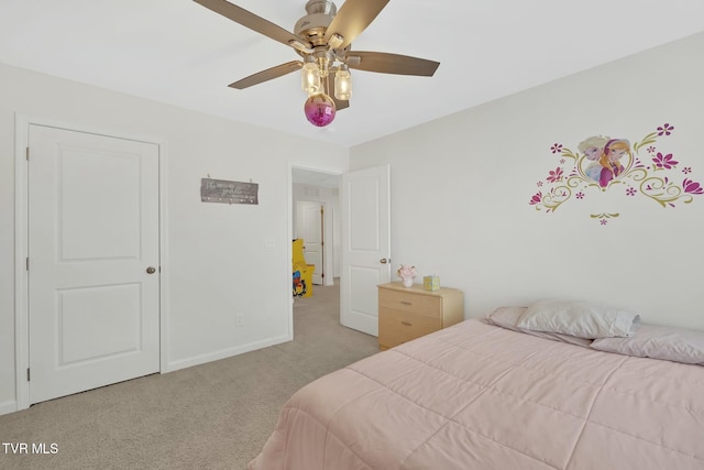 carpeted bedroom featuring ceiling fan