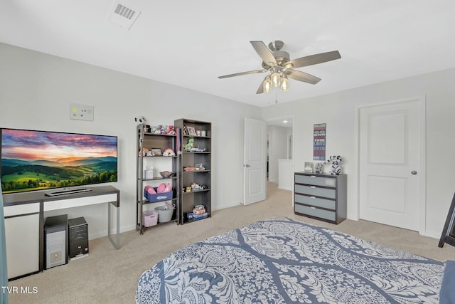 bedroom with ceiling fan and light colored carpet