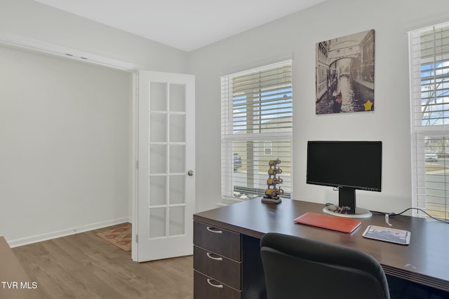 home office featuring light hardwood / wood-style flooring