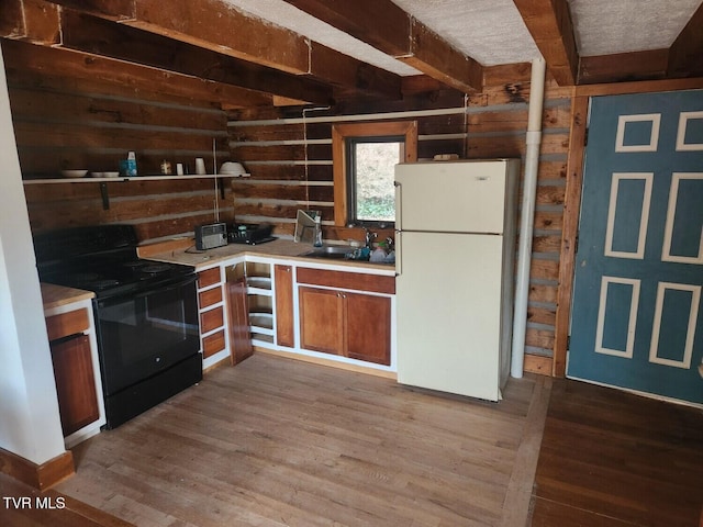 kitchen featuring sink, white refrigerator, light hardwood / wood-style floors, black range with electric cooktop, and beam ceiling