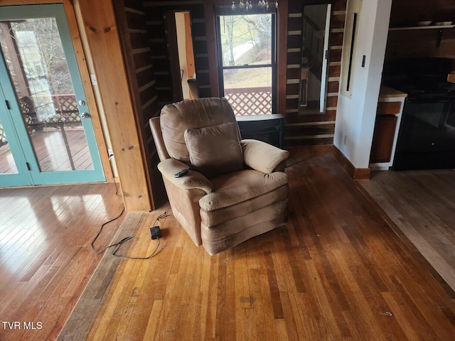 sitting room featuring hardwood / wood-style floors