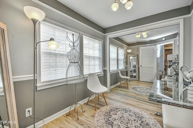 sitting room featuring hardwood / wood-style floors