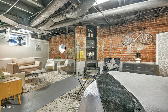 interior space featuring brick wall