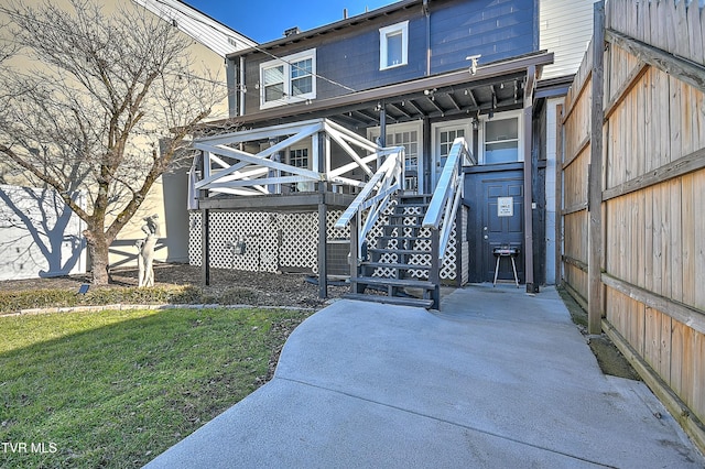 exterior space with a porch and a yard