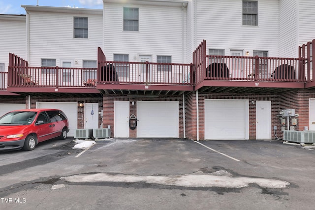 back of property with central air condition unit