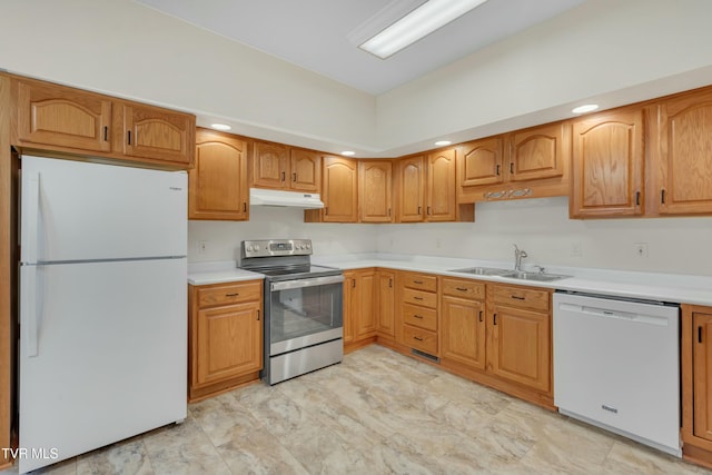 kitchen with sink and white appliances