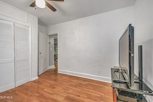 interior space featuring ceiling fan and light hardwood / wood-style flooring