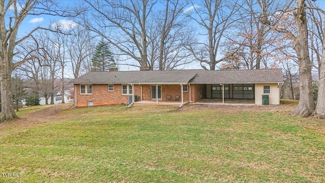 520 Heritage Ln, Jonesborough, TN 37659 - ranch-style home with brick siding, a chimney, and a front yard
