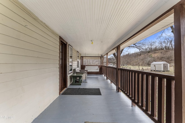 view of patio with a shed