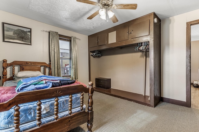 bedroom with light colored carpet and ceiling fan