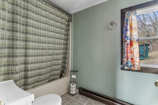 bathroom with shower / tub combo with curtain, wooden walls, a baseboard radiator, tile patterned flooring, and toilet