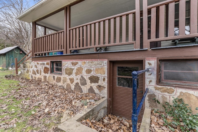 view of home's exterior with a balcony