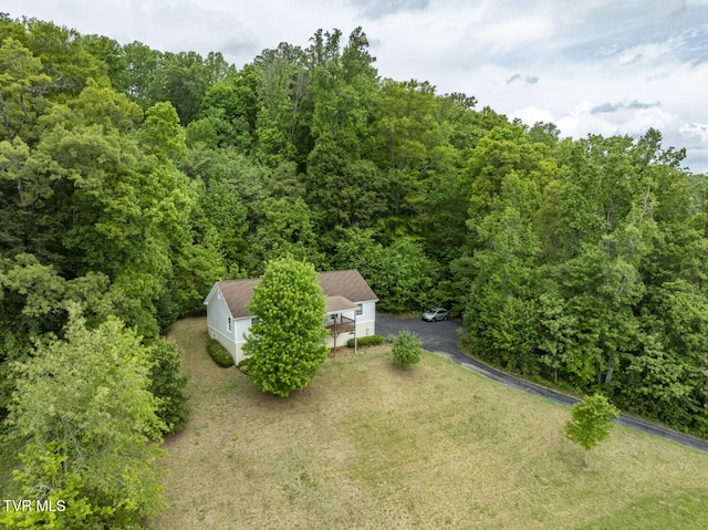 aerial view with a wooded view