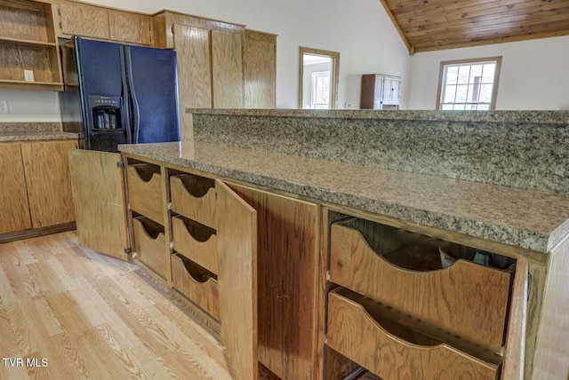 kitchen featuring open shelves, wooden ceiling, light wood-type flooring, vaulted ceiling, and black fridge with ice dispenser