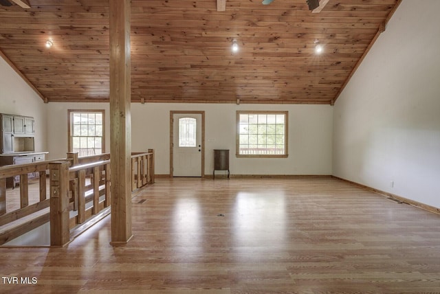 additional living space featuring wooden ceiling, vaulted ceiling, and light wood-style flooring