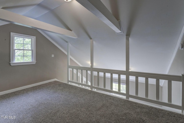 bonus room featuring carpet floors and lofted ceiling