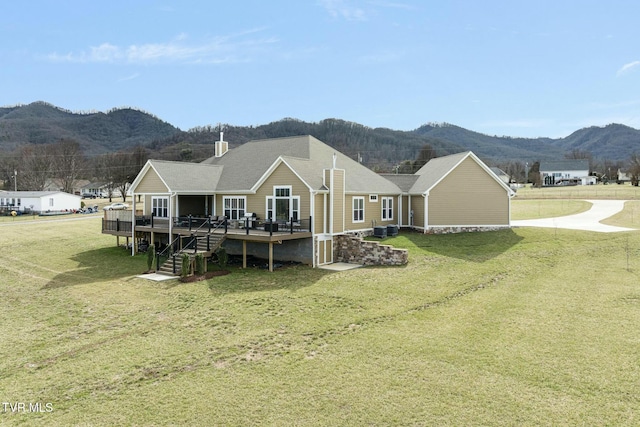 132 Hamilton Rd, Elizabethton, TN 37643 - back of property with a deck with mountain view and a lawn